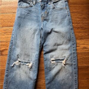 Distressed Blue Denim Jeans